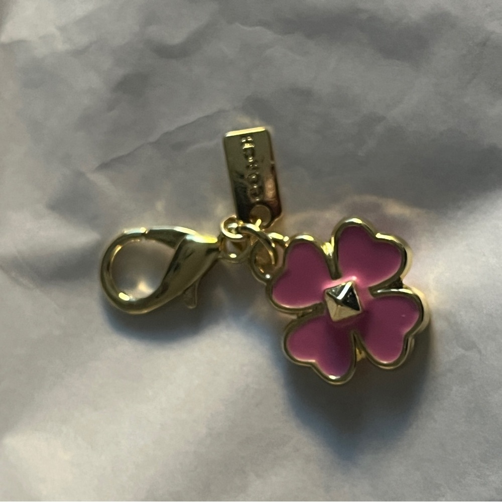 Pink Floral Bag Charm Zipper Pull with Gold Hardware with small Hang Tag.